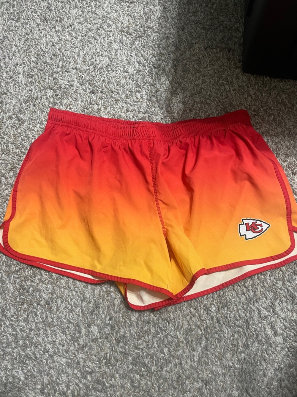 NFL Women’s Gradient Red and Yellow Athletic Shorts